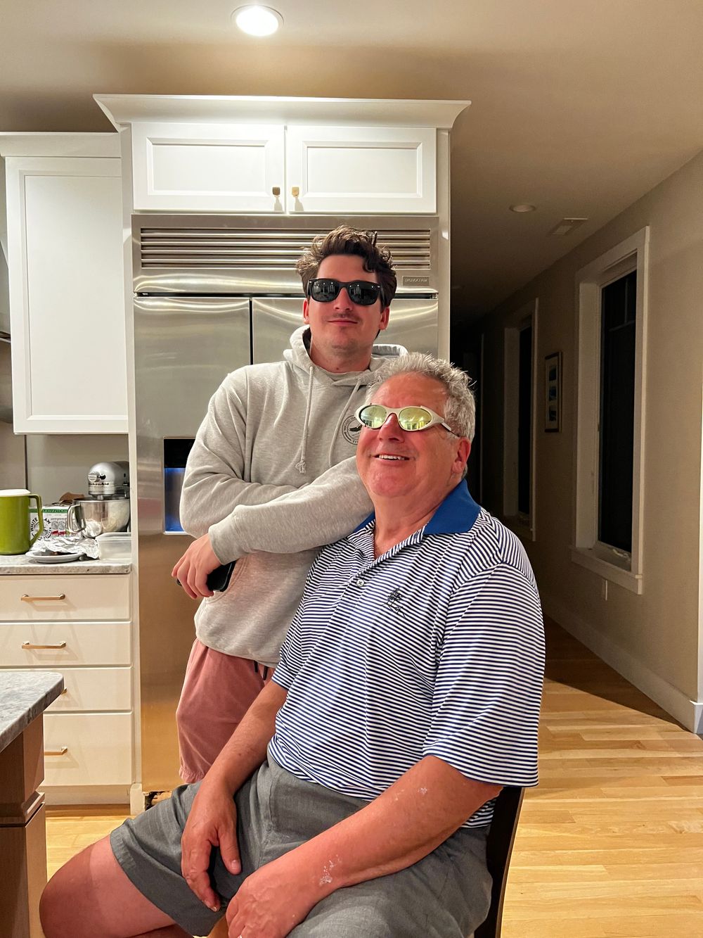 Father and son wearing glasses